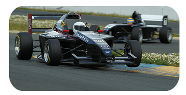 3 wide through turn 1 at Infineon Raceway at the Indy GP of Sonoma